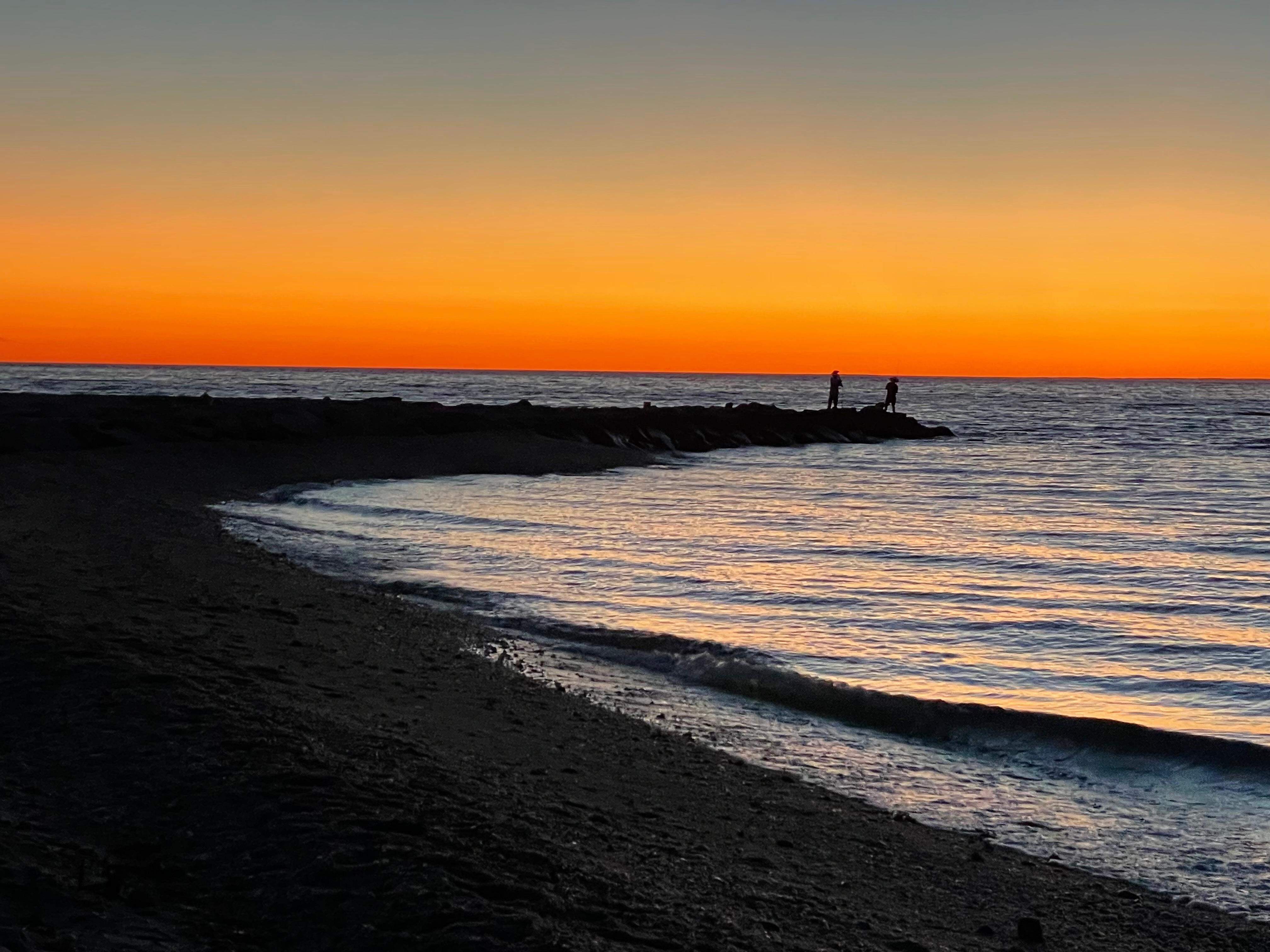 Sunset at the beach at the end of the block.