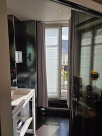 All windows open two entries for standing balcony one by sink and toilet area which gave natural lighting and cross breeze