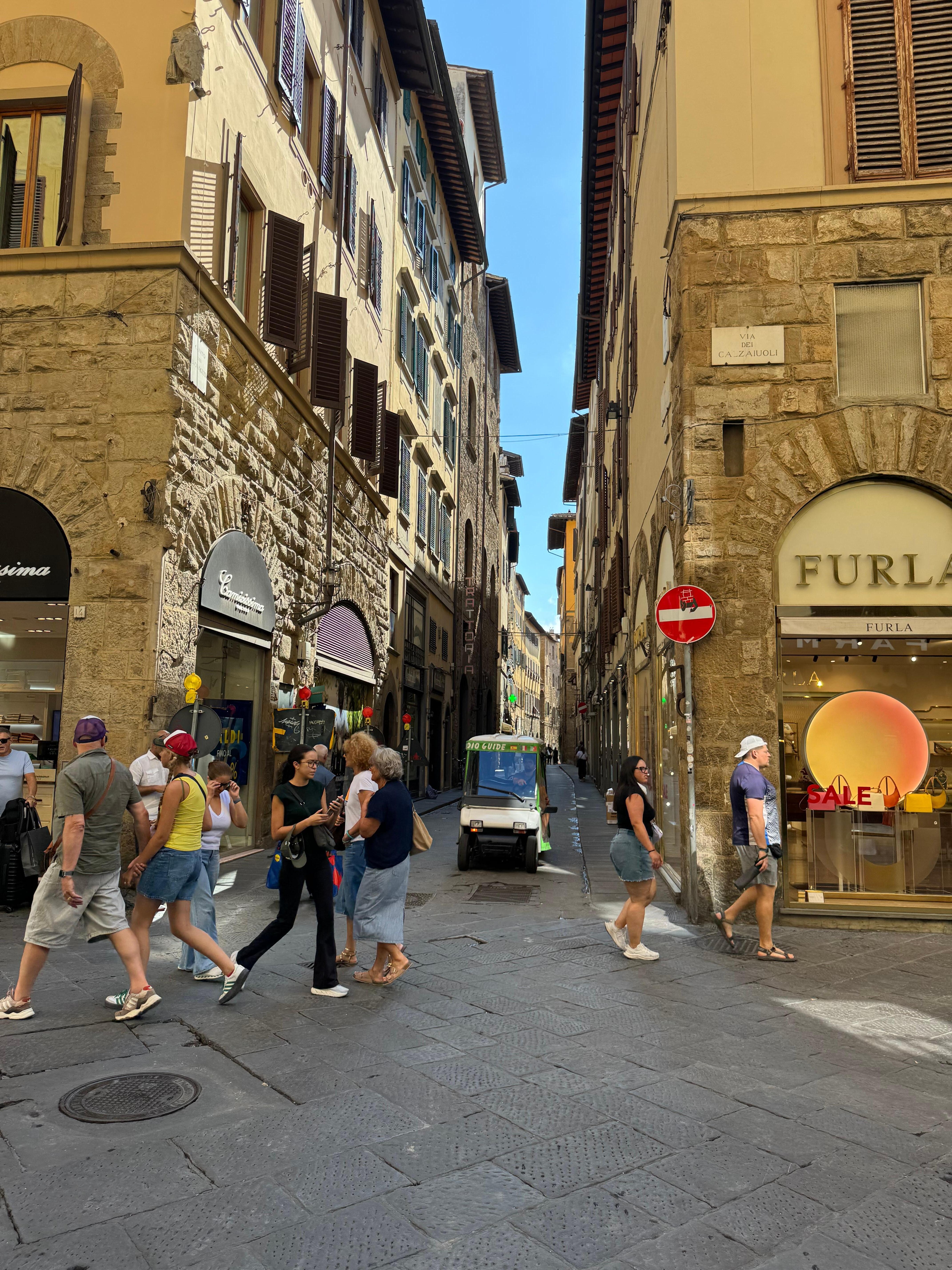 Shopping district little leather store customized a belt for Kyle wonderful workmanship bought genuine leather purse loved Florence food spectacular!