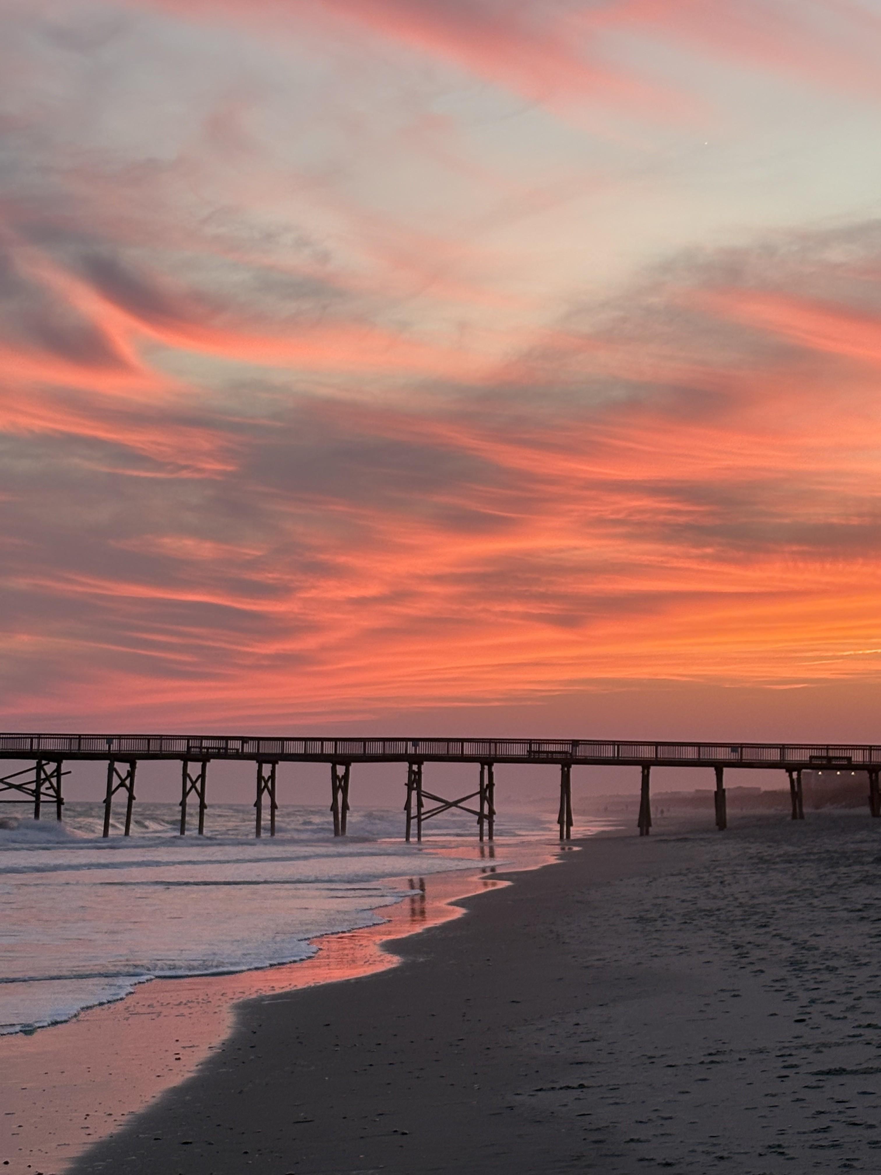 Sunset on the beach in front of the condo