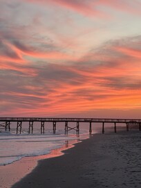 Sunset on the beach in front of the condo