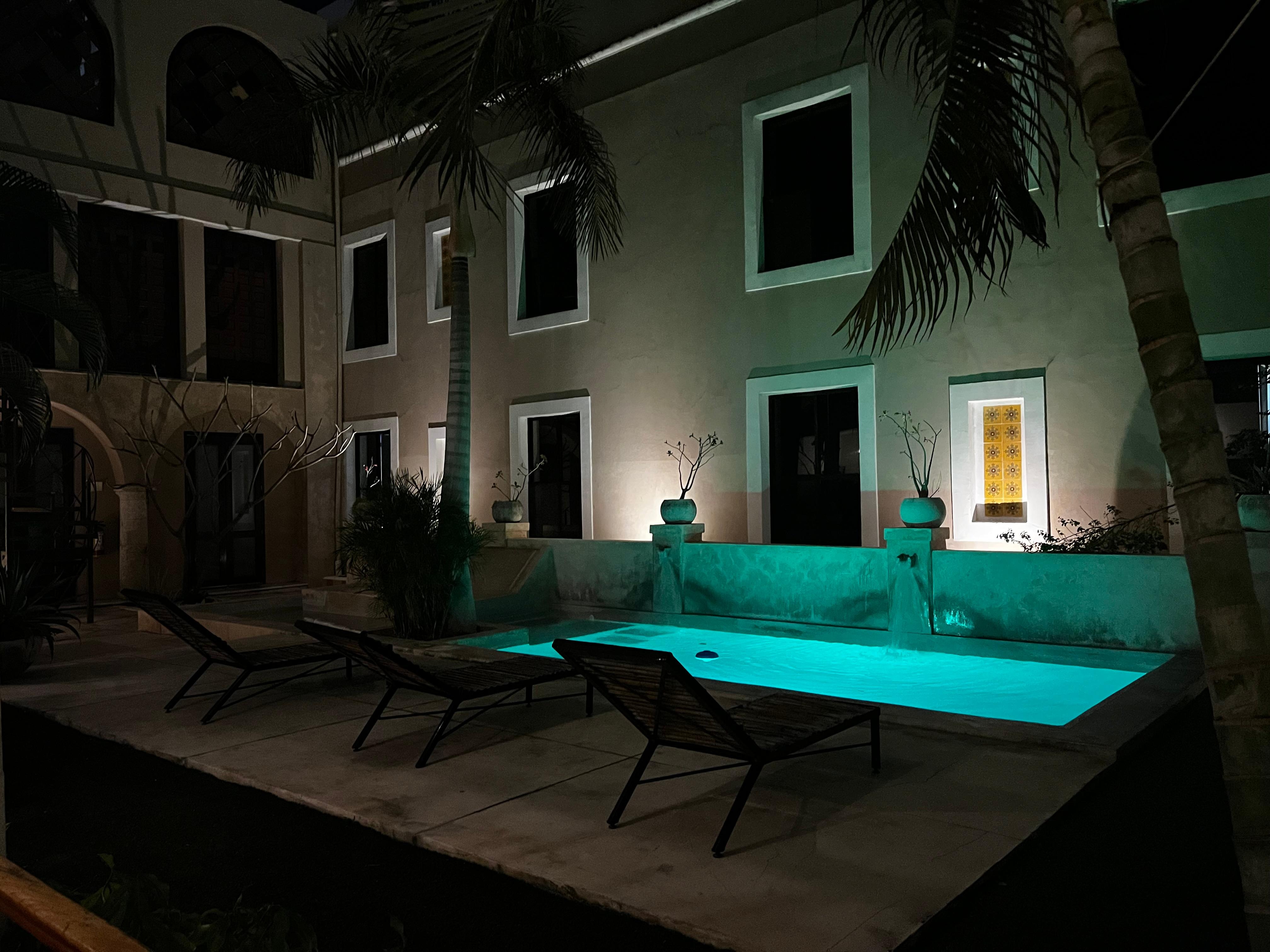 The pool has disco lights that change color at night