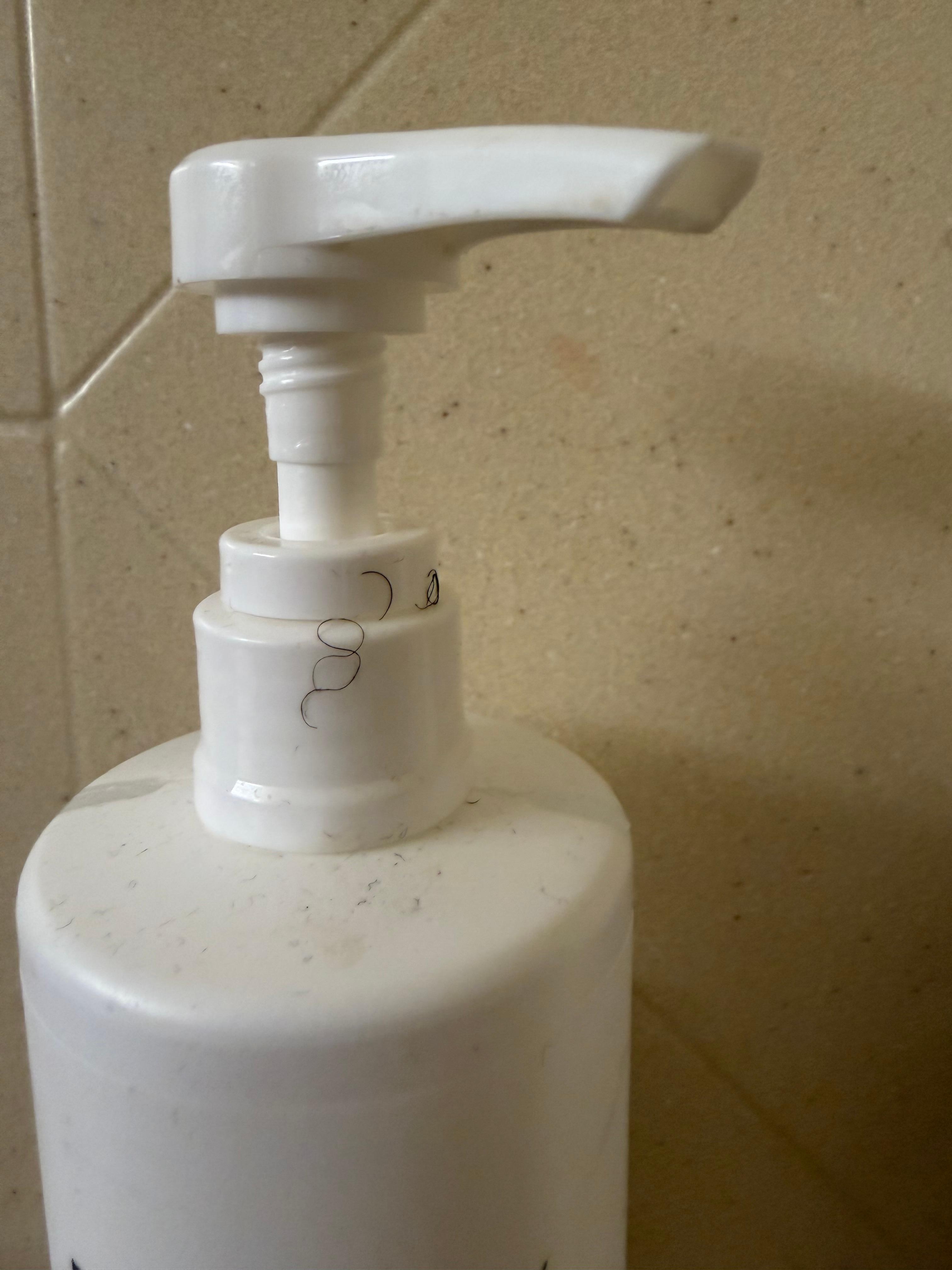 Hair on shampoo bottle in the shower. 
Also, hallway carpet was dirty with many spots on the third floor.  Also, there were only two cups to drink water with in a room with 2 queen size beds. 