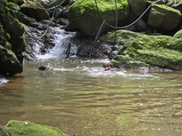 Snorkeling for prawns in the river.