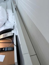 Light panel behind the bed was not clean