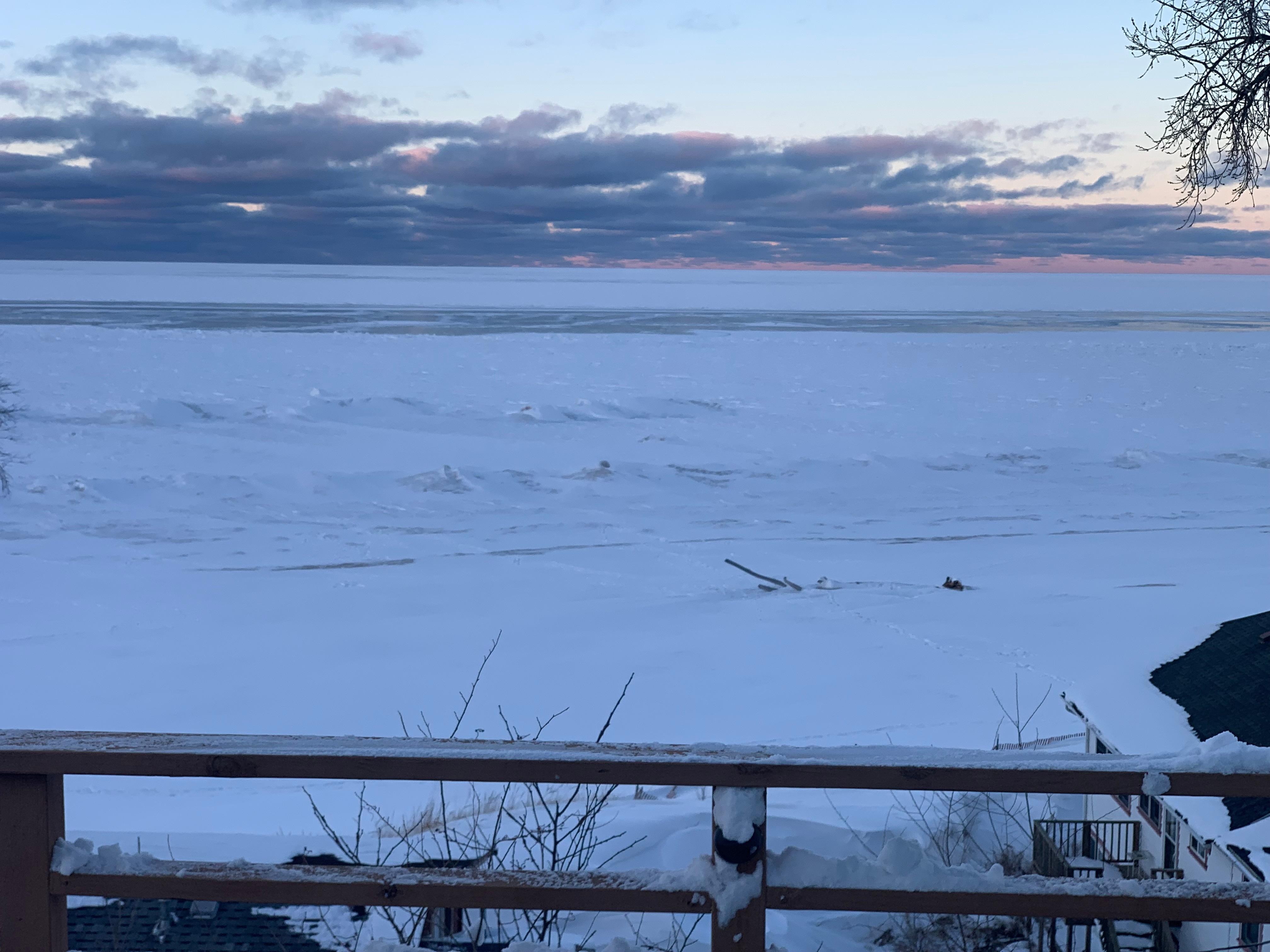 New Day begans along the frozen sheet of Lake Michigans Ice