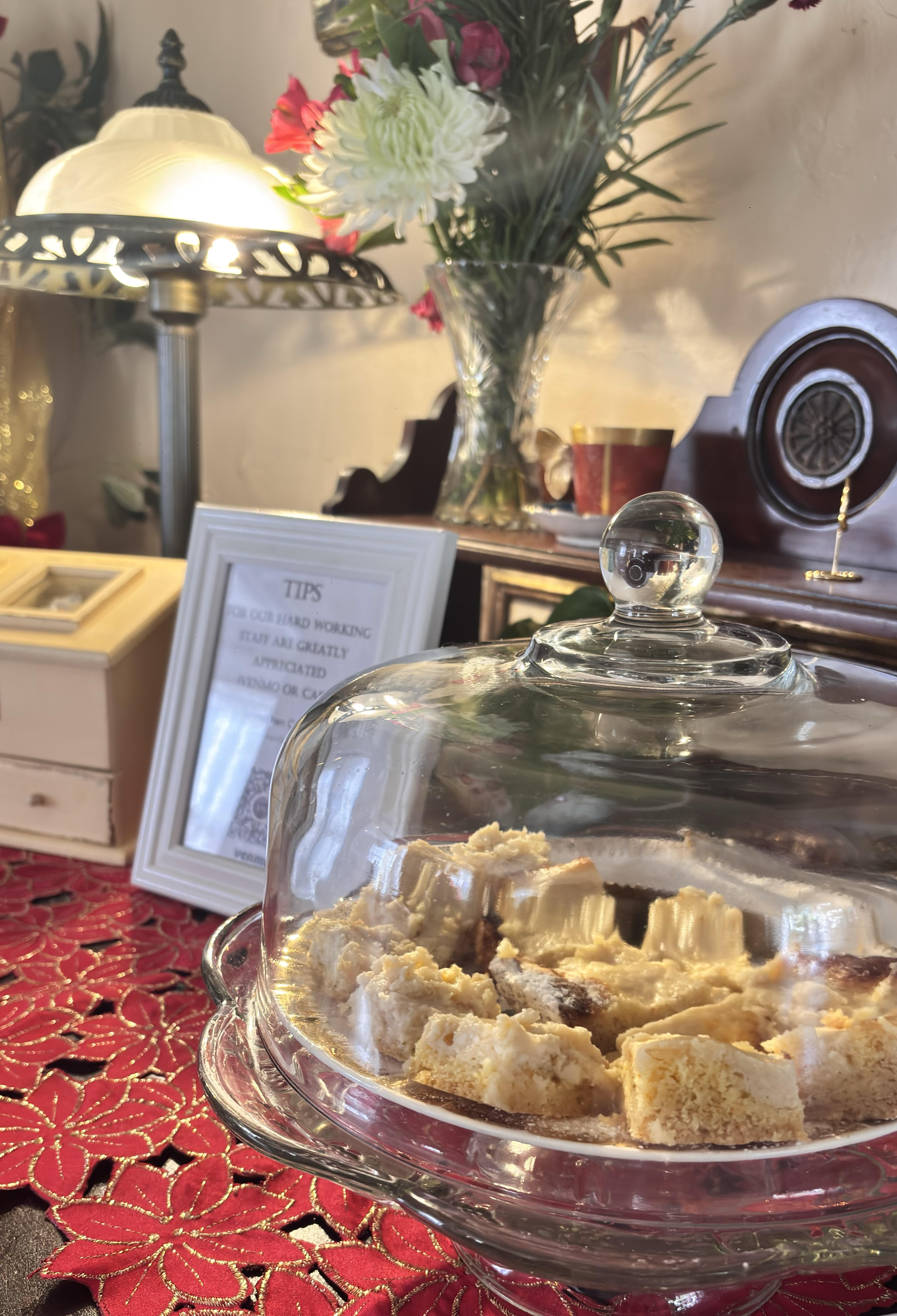 The parlor had goodies, coffee and wine. 