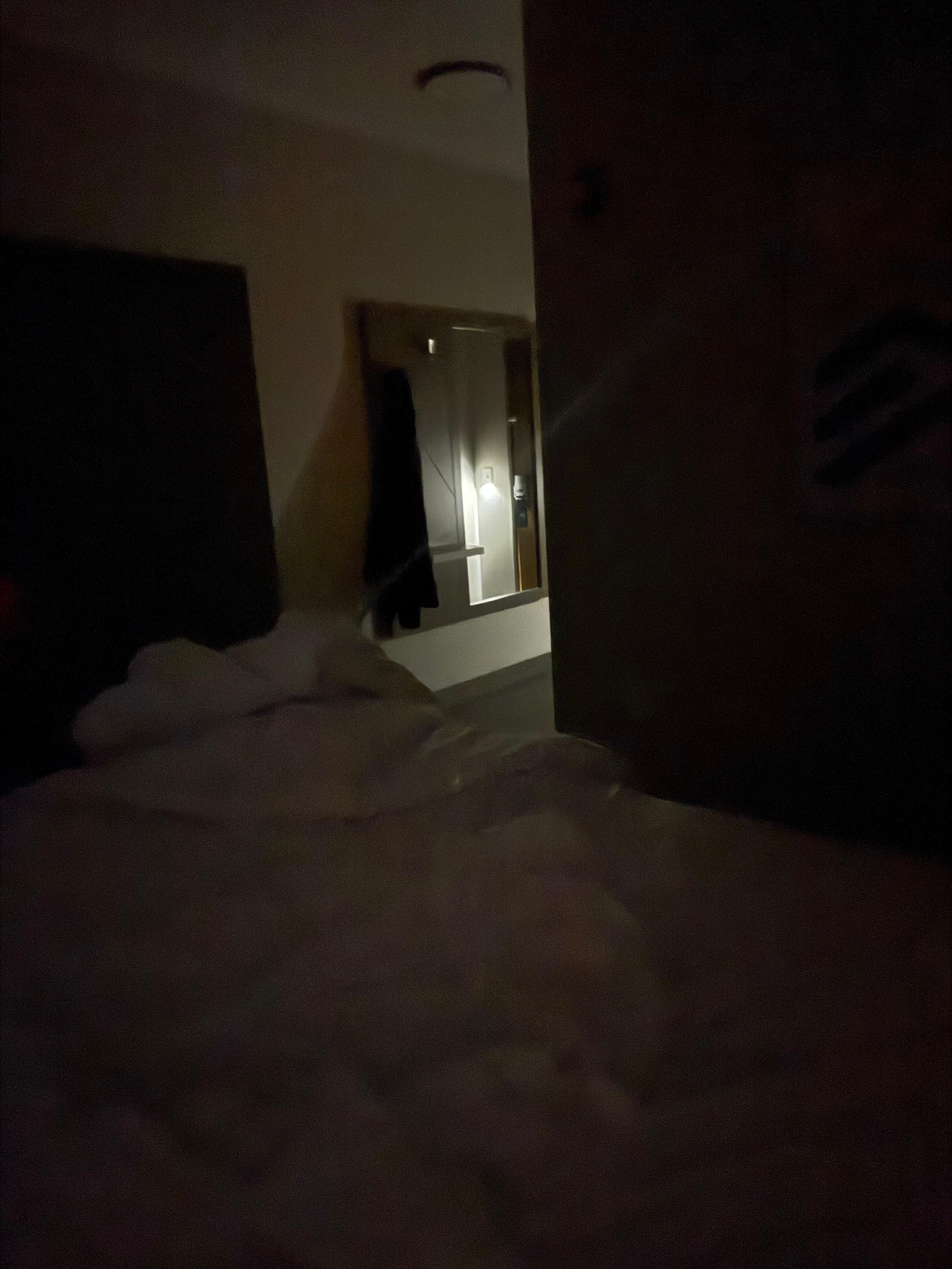 The light bouncing off the mirror onto the bed. Poor design. 