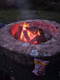 Toasting marshmallows on the outdoor firepit