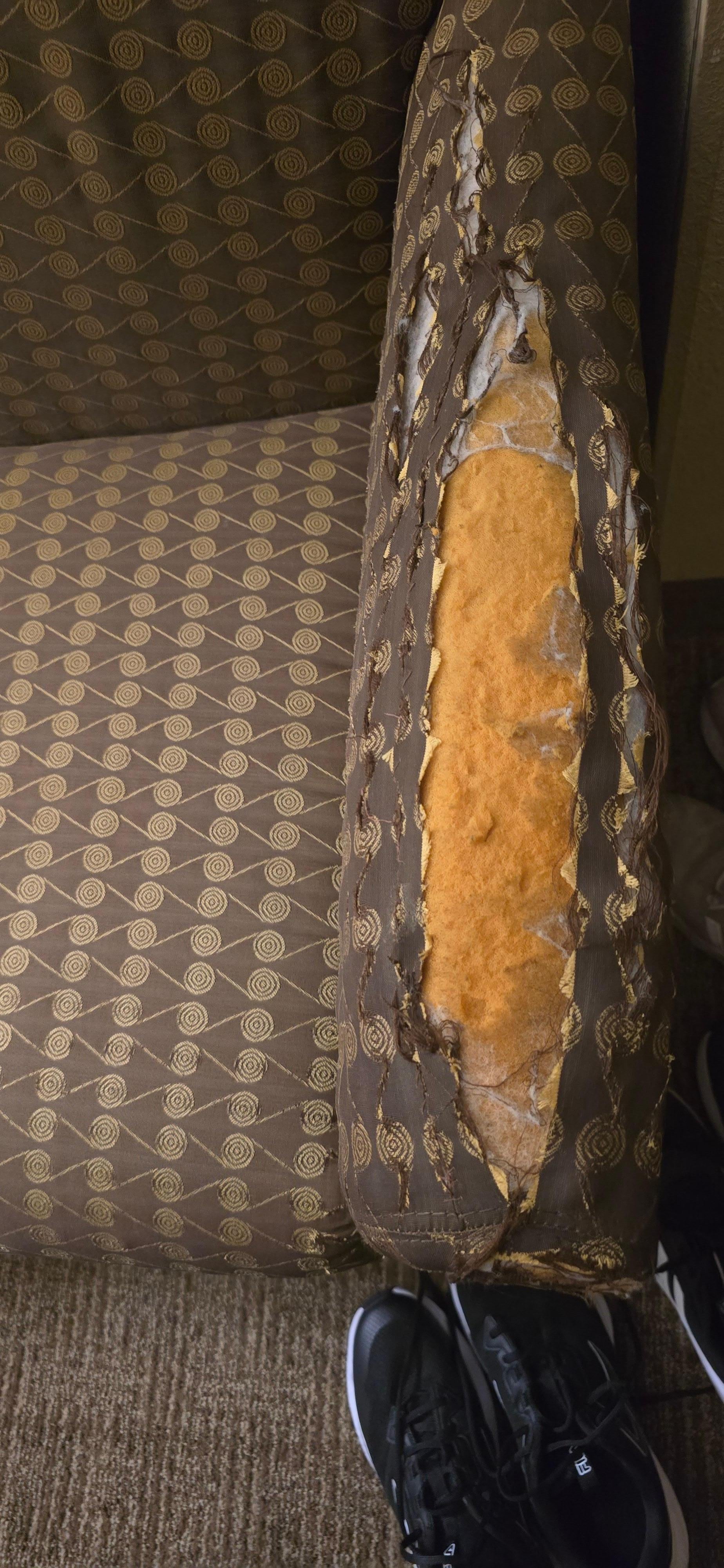 Arm of pull out sofa bed.