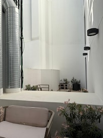 Lovely view of ventilation shafts and whitewashed interior walls