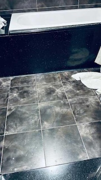 Bathroom floor with sharp conical bumps