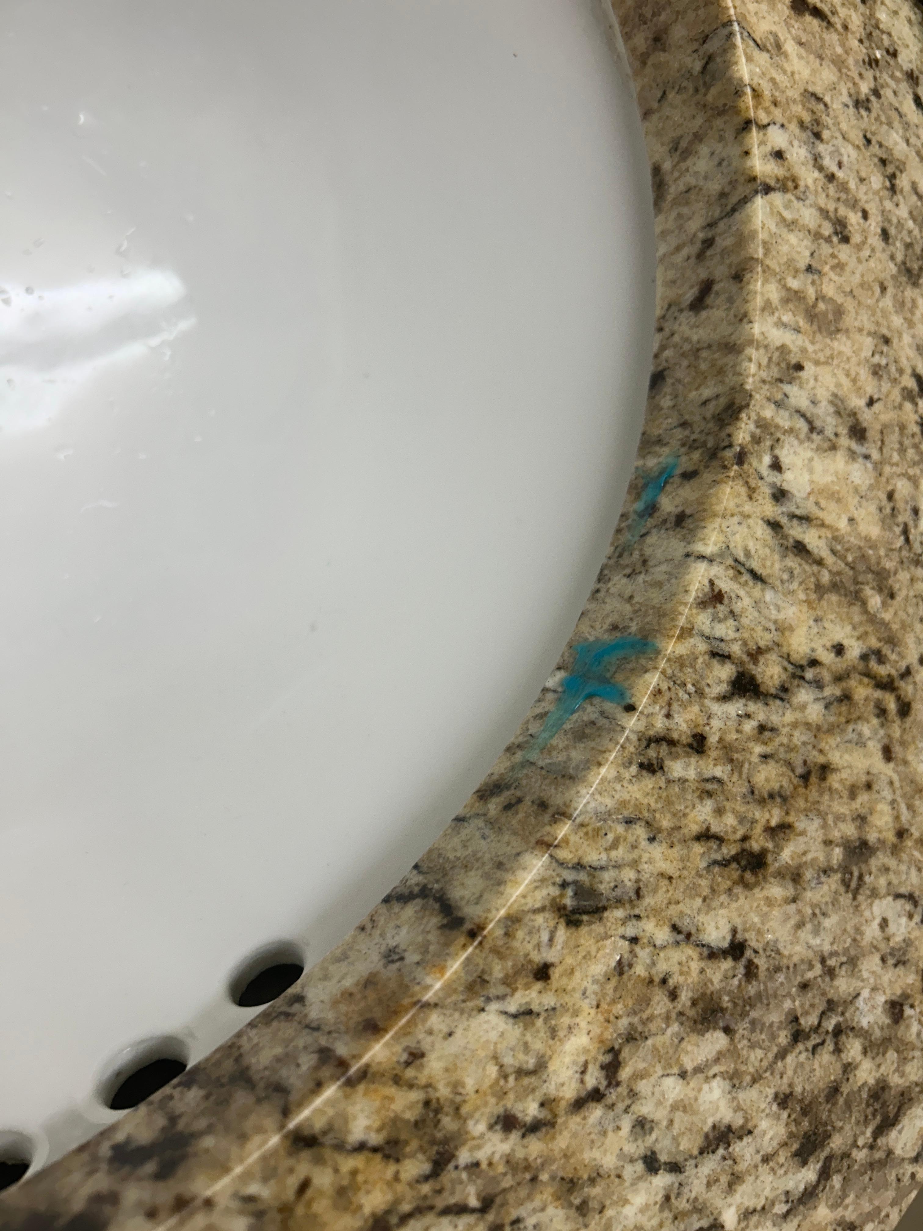 Picture of toothpaste in sink.
