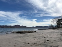 The beach below the building