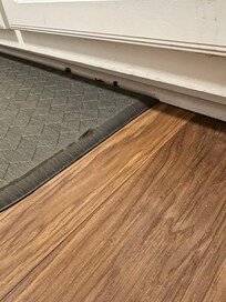 Dog food under the cabinet where you stand to wash dishes.