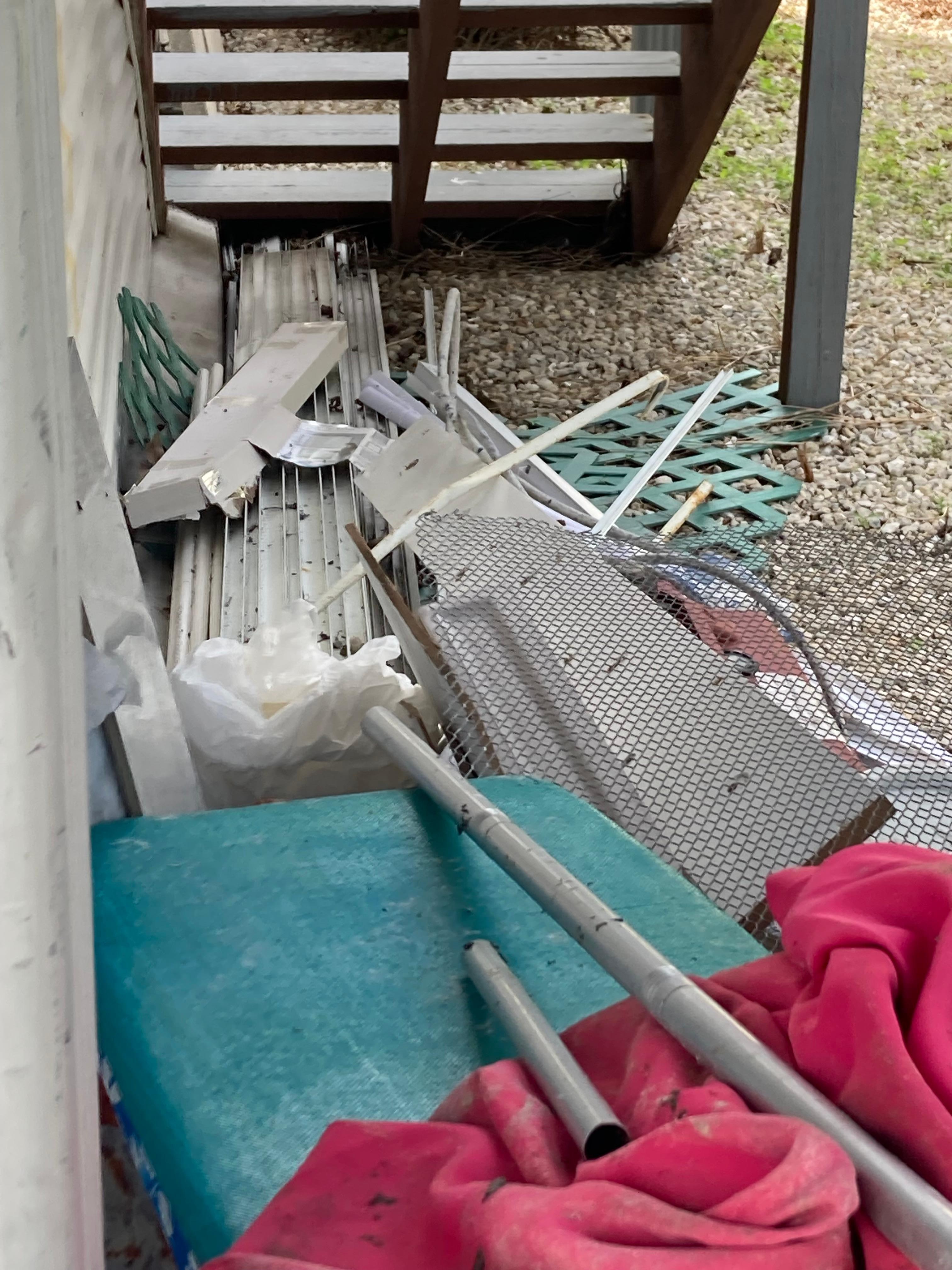 Pile of crap in backyard near "patio" area