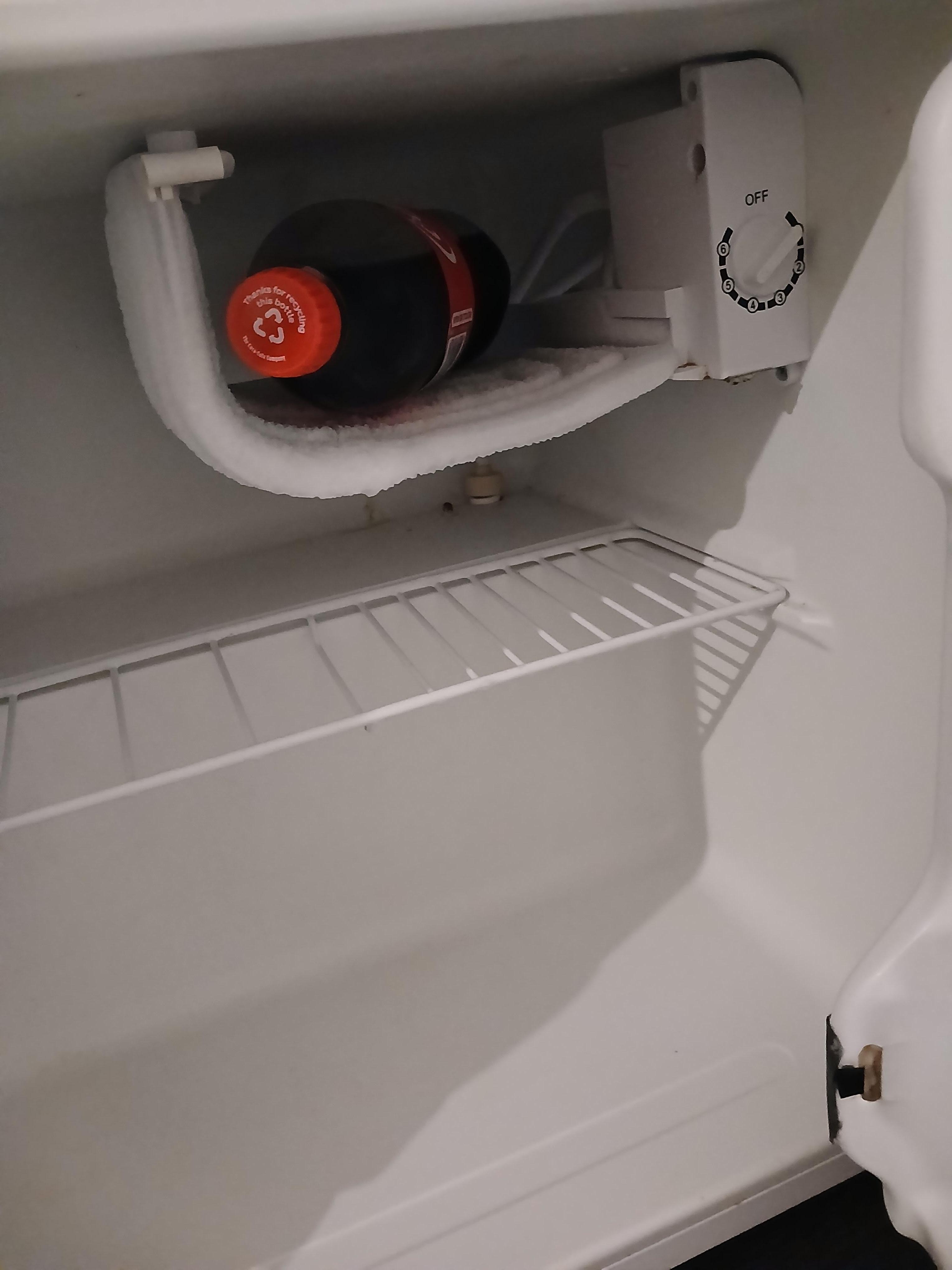 An opened soft drink left over by previous guests.  What a dirty hotel. Still called "comfort"?"