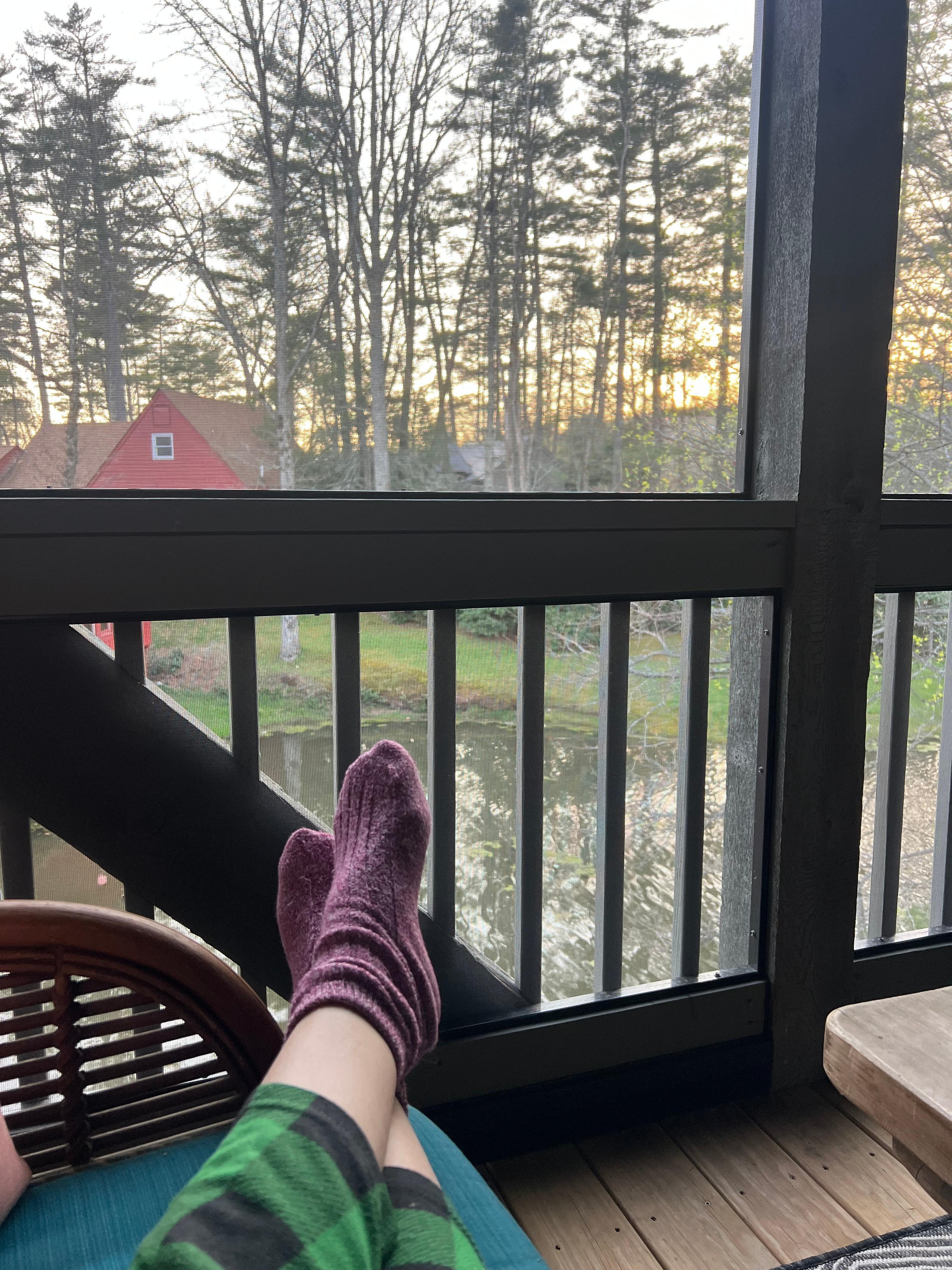 Lounging in the screened in porch overlooking the pond. Sorry for the Jammies!