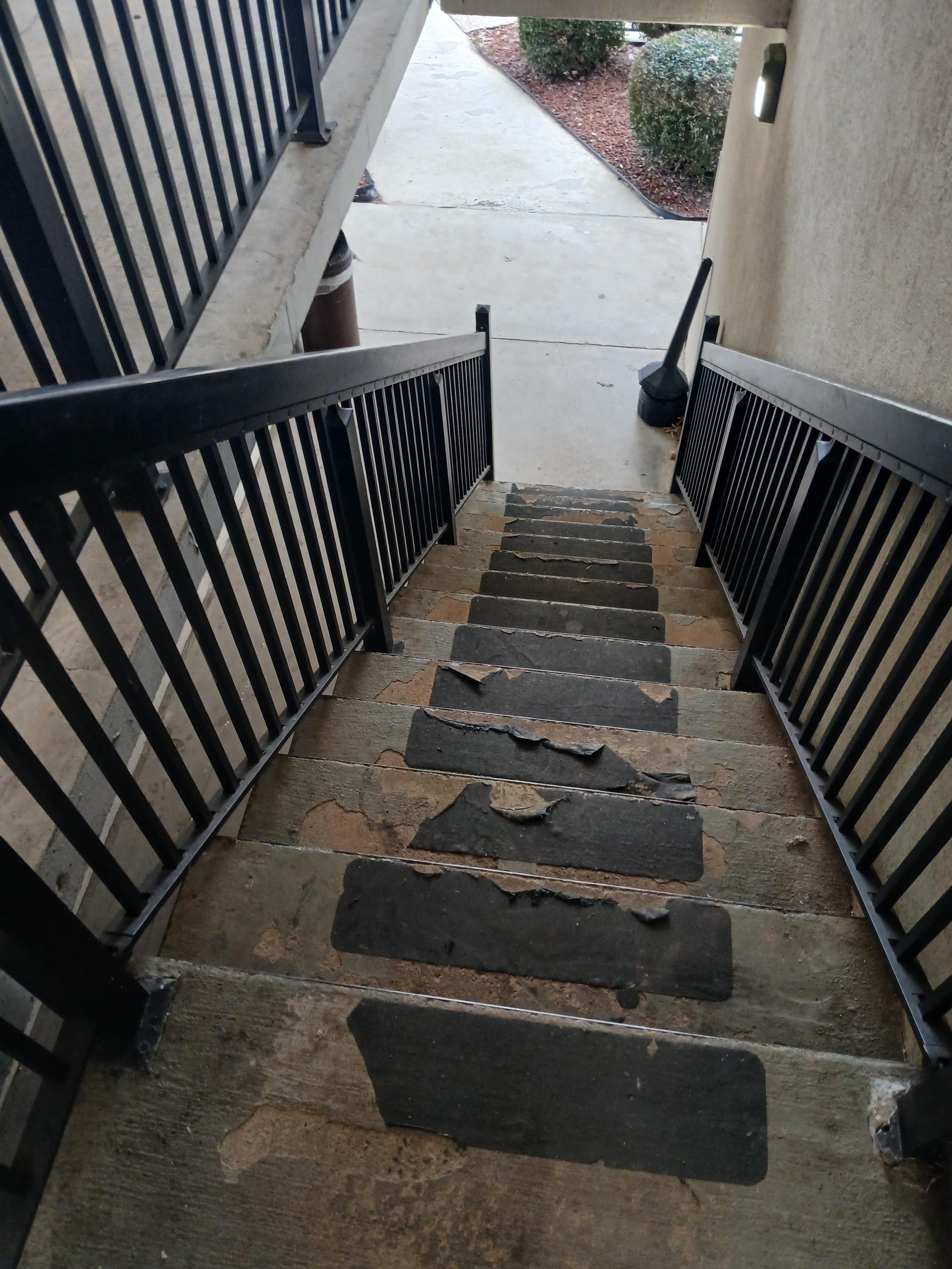 Unsafe stairs leading to second floor.