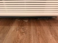 Water stains and grime under the AC unit with the window open when we arrived