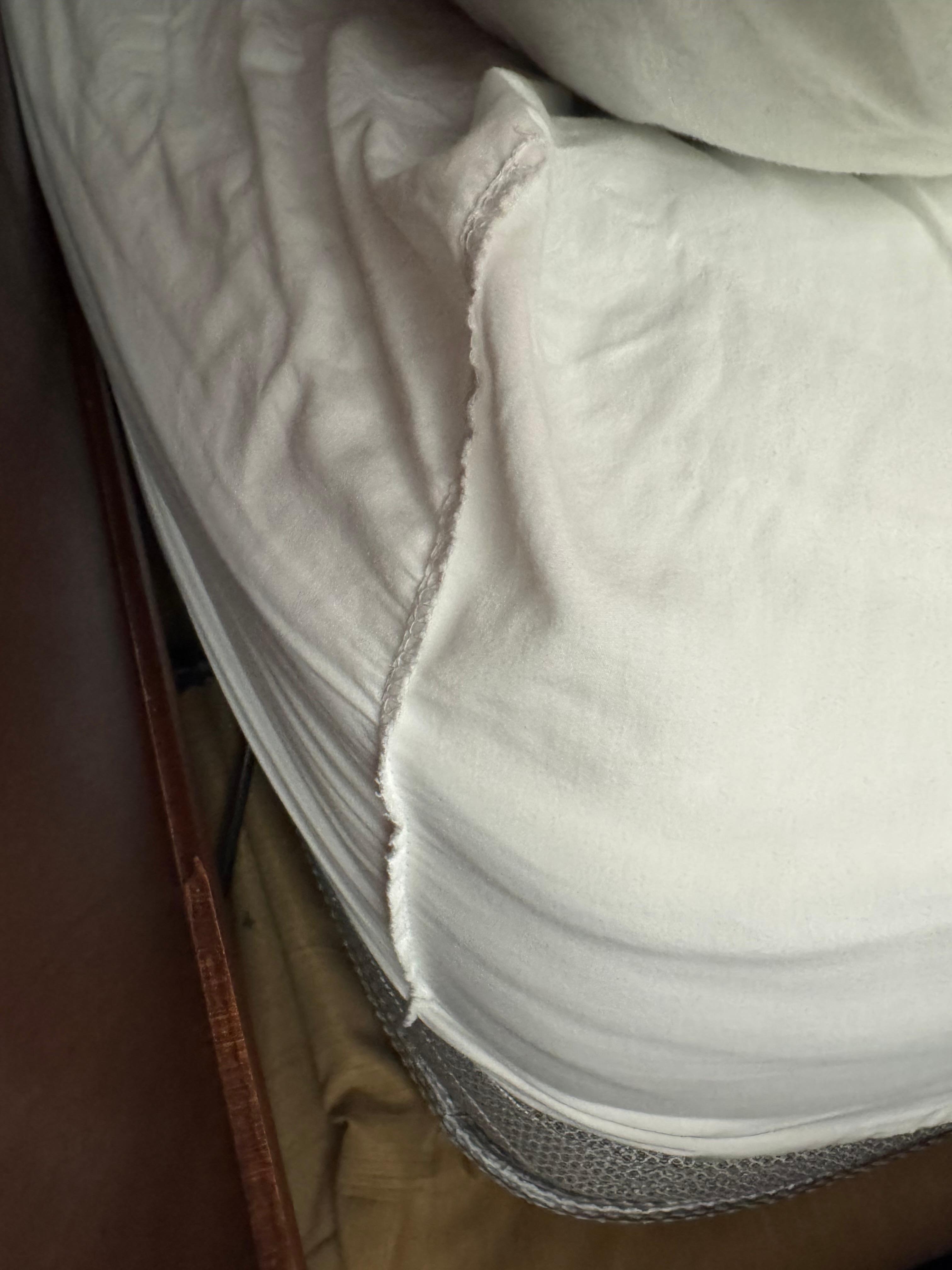 Bedsheets turned inside out. It makes you wonder if they change the sheet or just use the old one. 