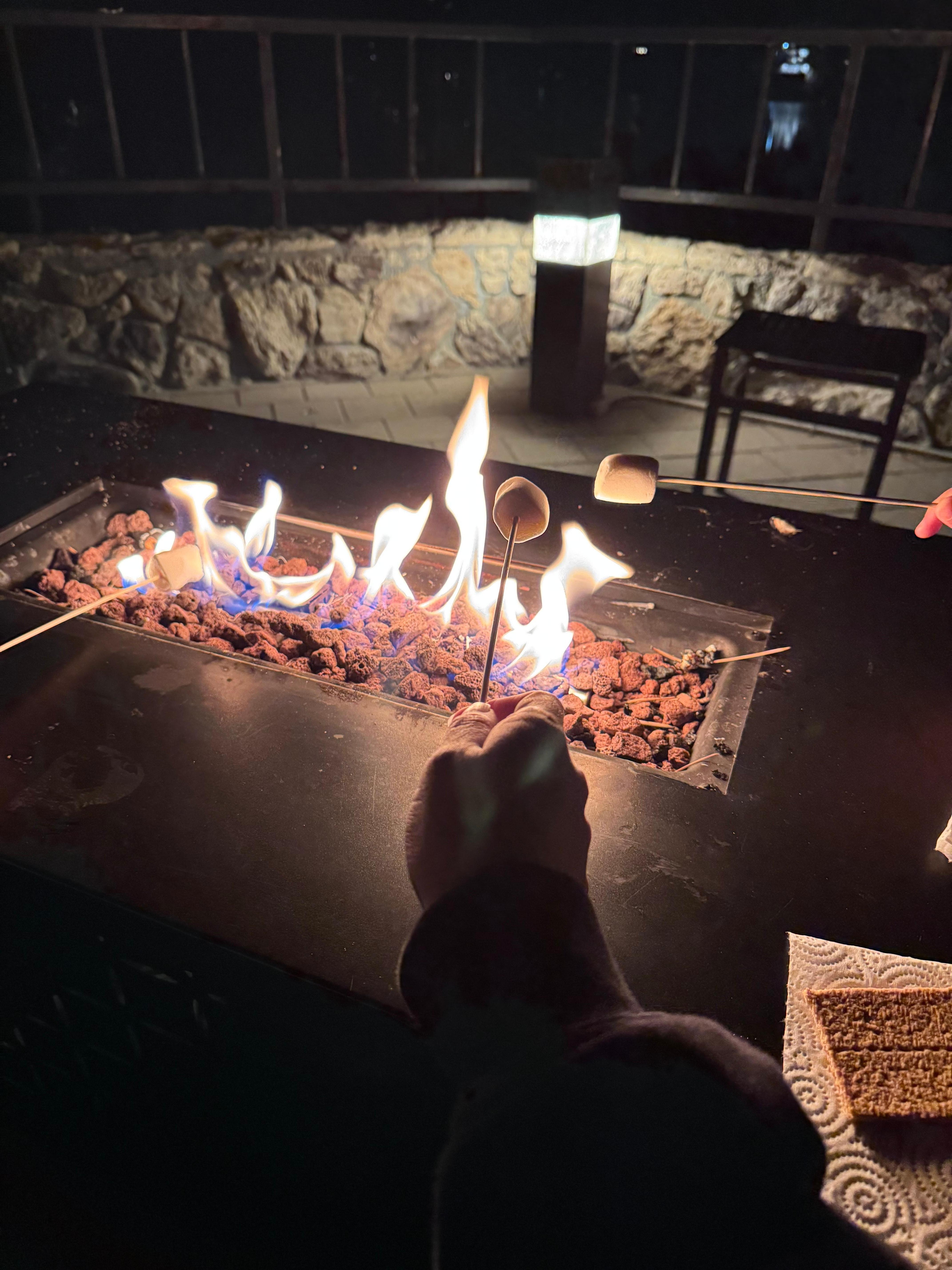 S’more’s at night time in the fire pits outside!