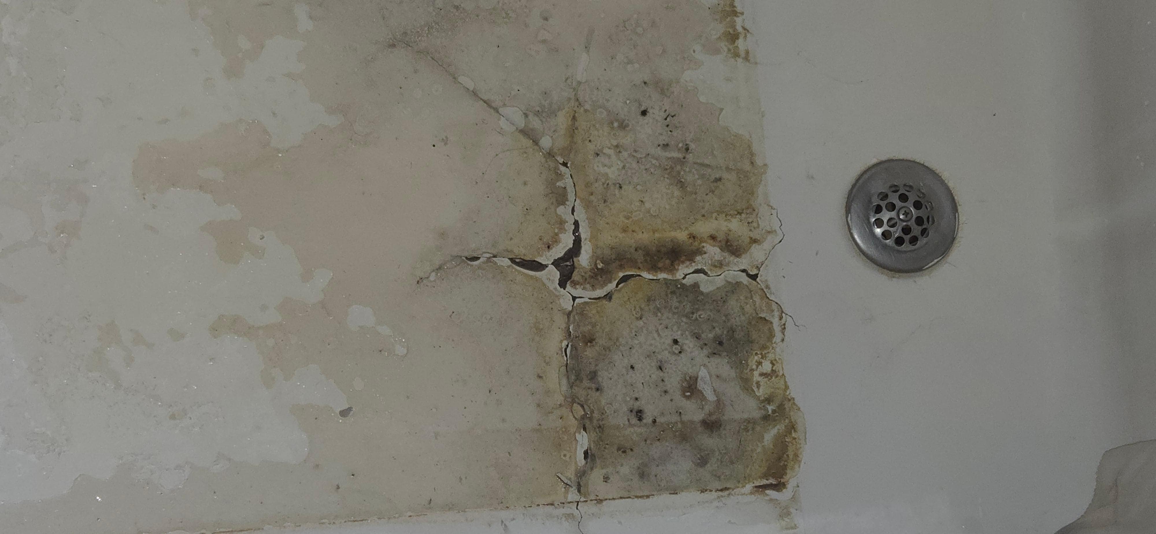 Cracked tub. Using mat up cover up. 