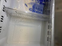 Garage fridge did not work and was filled with water