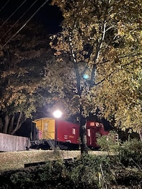 Outdoor space is very nice- including a large shady tree and picnic table. On the other side is the firepit. Very private and not close to any neighbors.