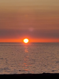 Nightly conch blowing as the sun sets.