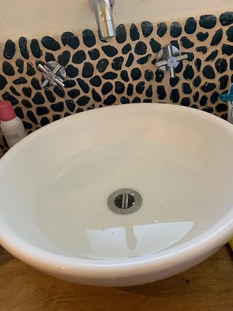 Écoulement lavabo à l'étage