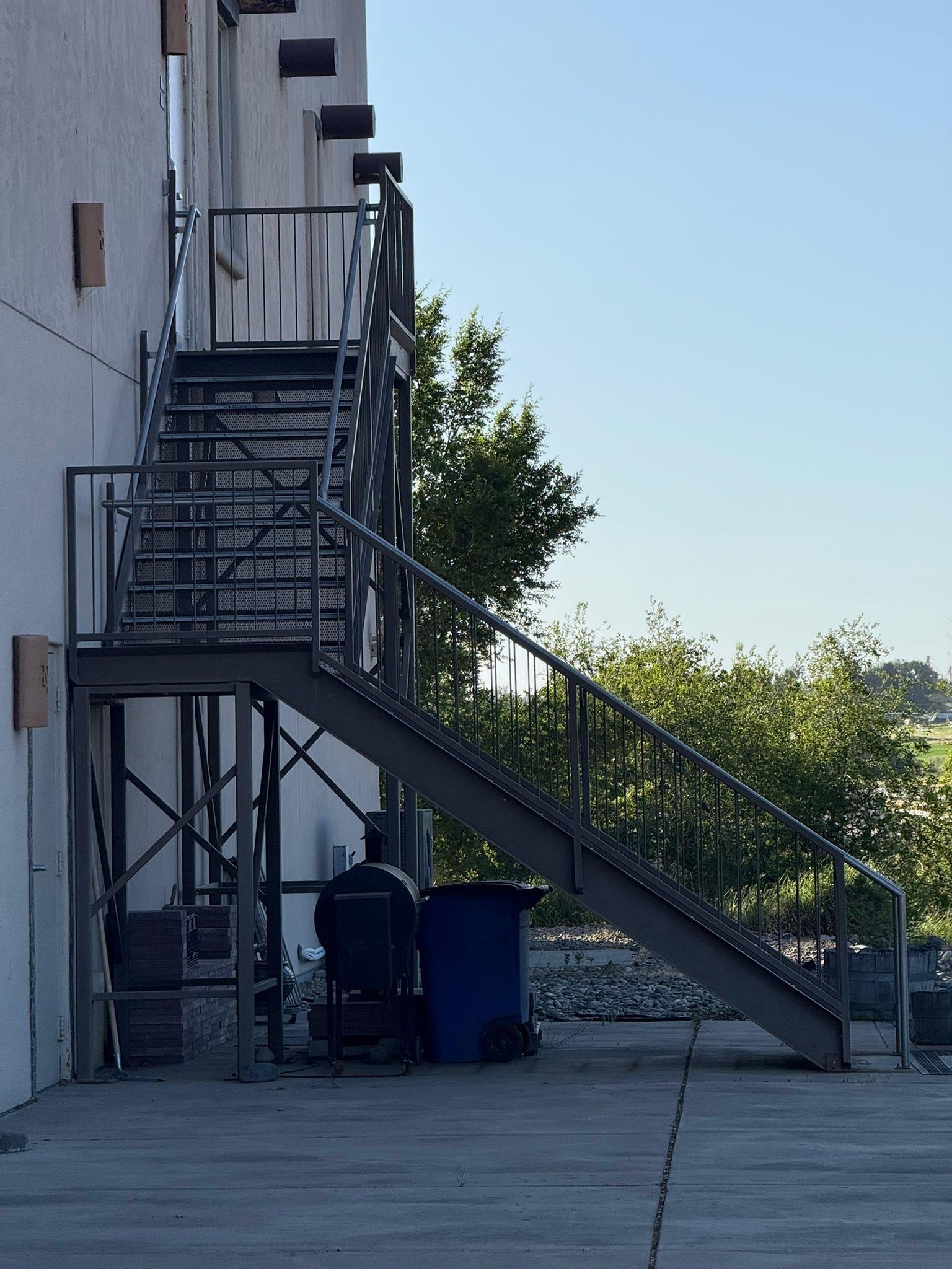The back door and stair you MUST use if you go out past 5 PM (or 7 PM Fri-Sat). Not clearly marked as the so-called “afterhours access door”. 