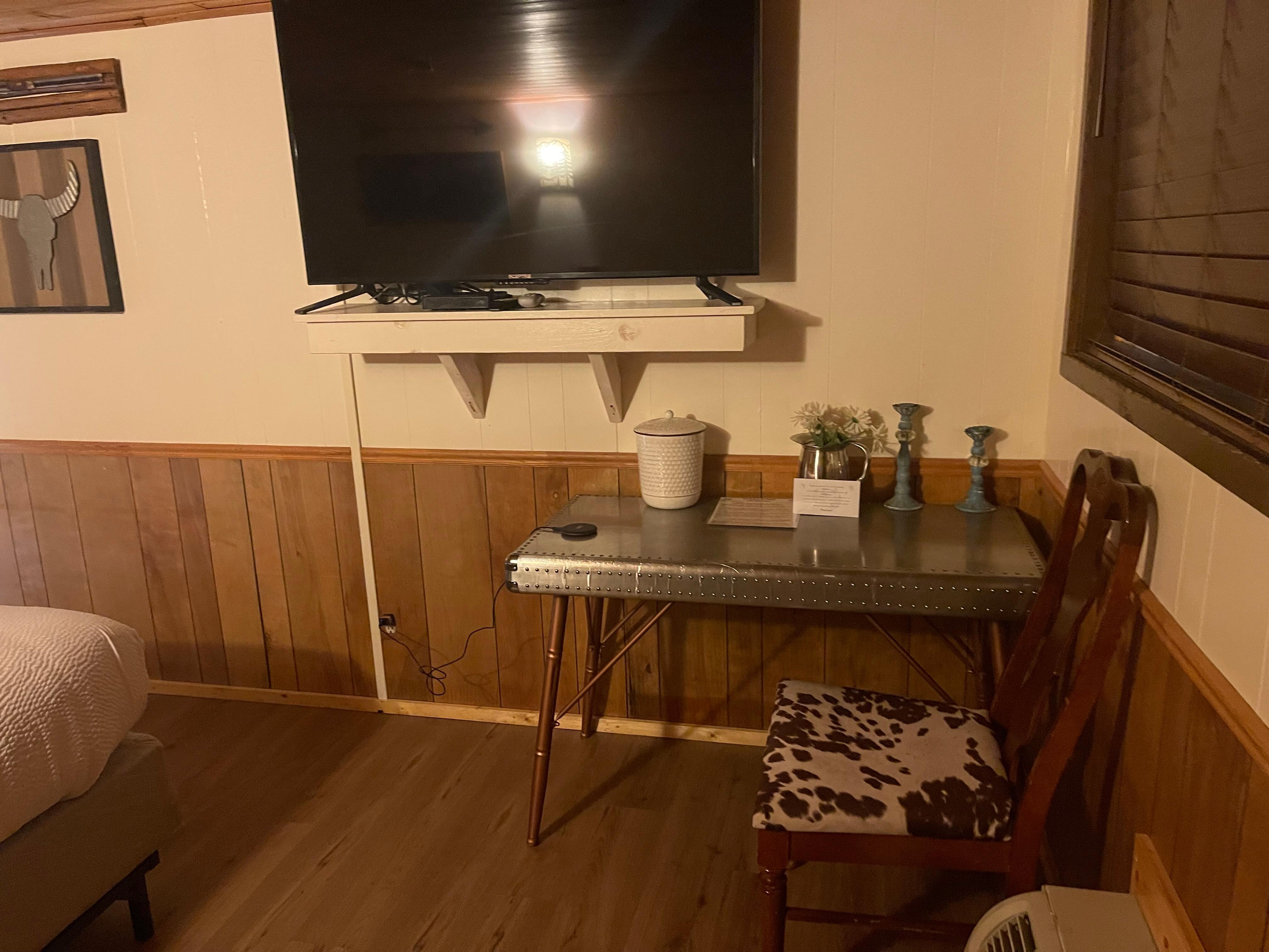 Convenience of your own air conditioning, tv table and chair