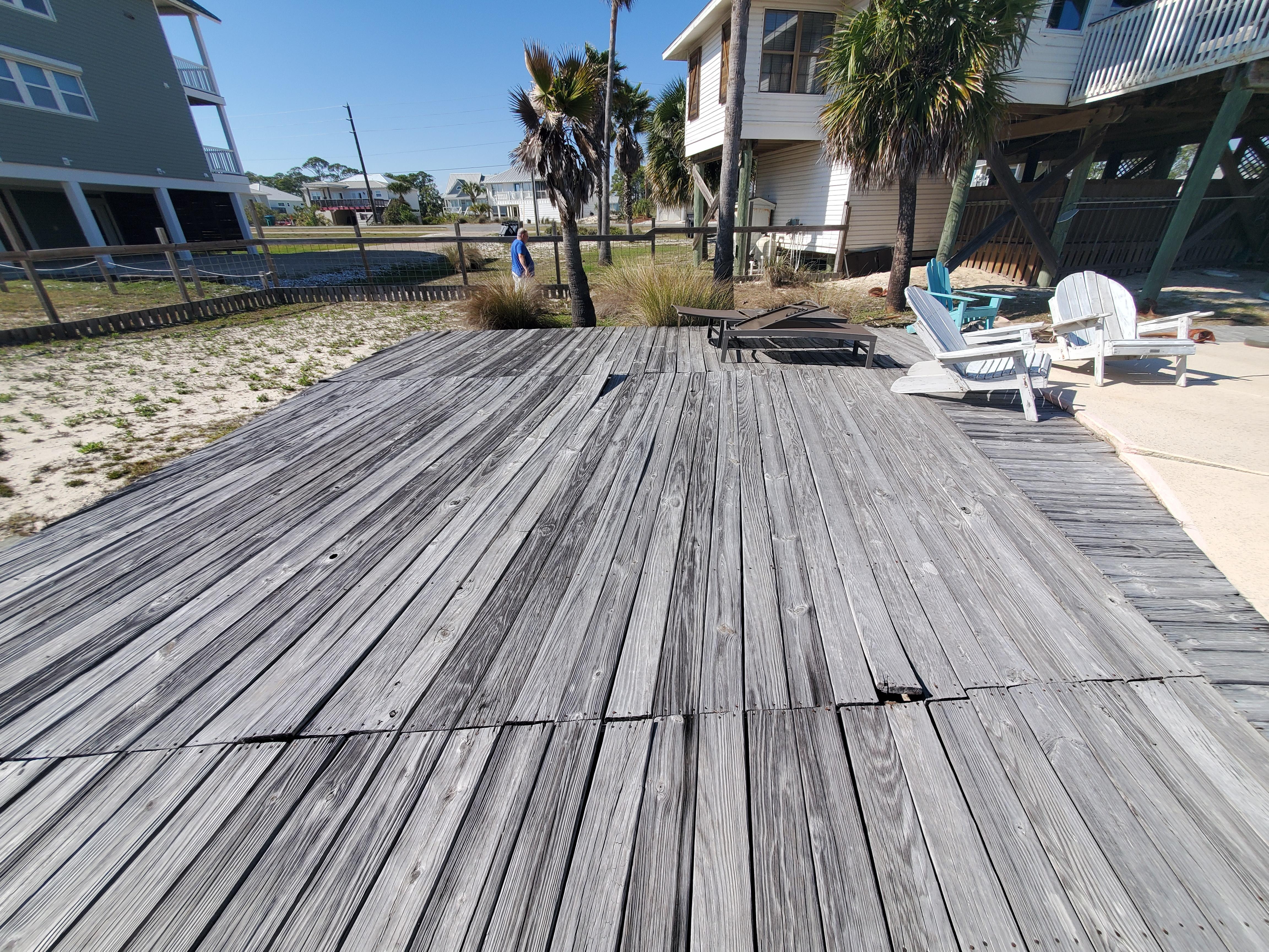 plank sticking up with nails