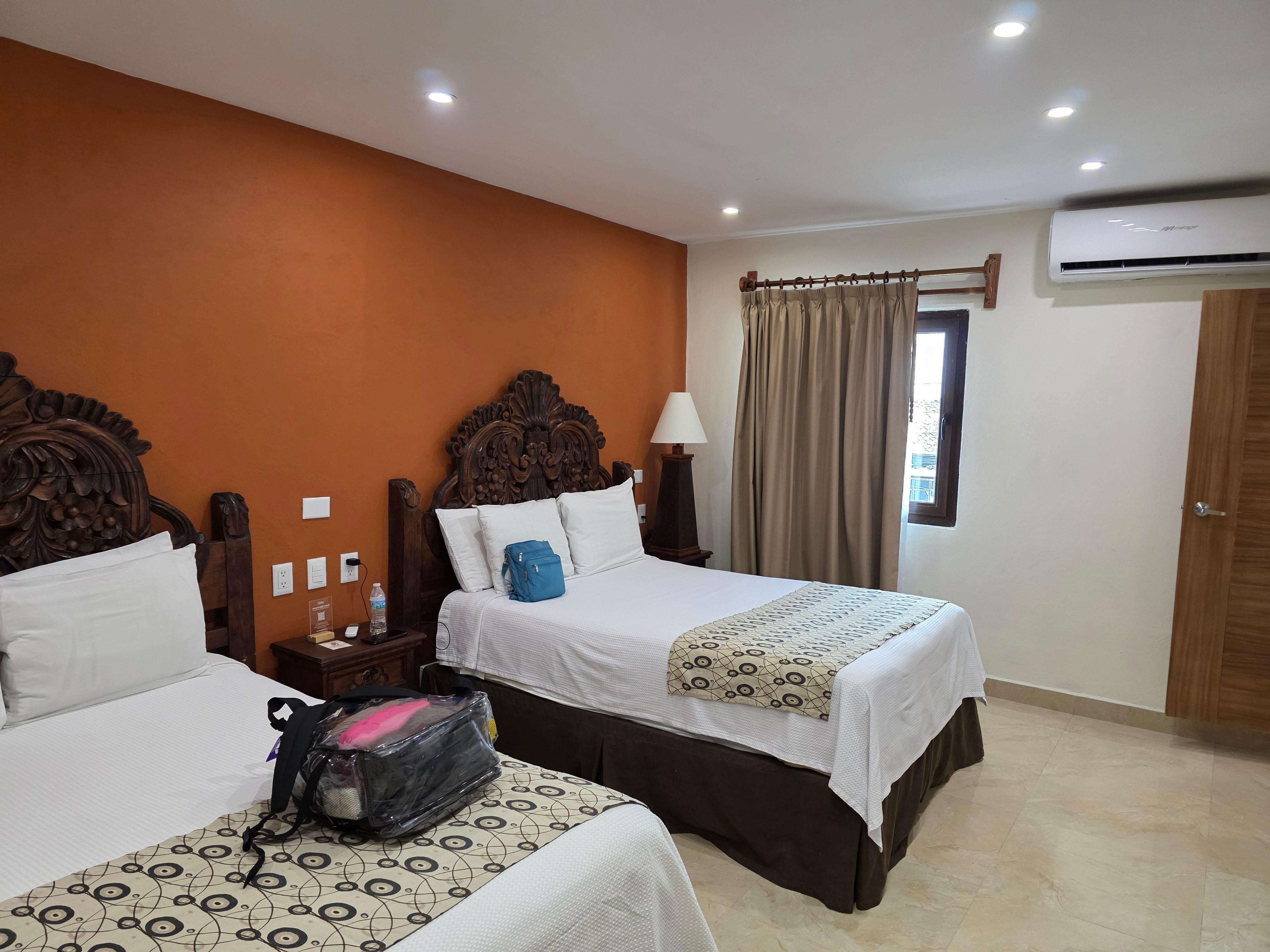 Clean and firm bed with plenty of pillows