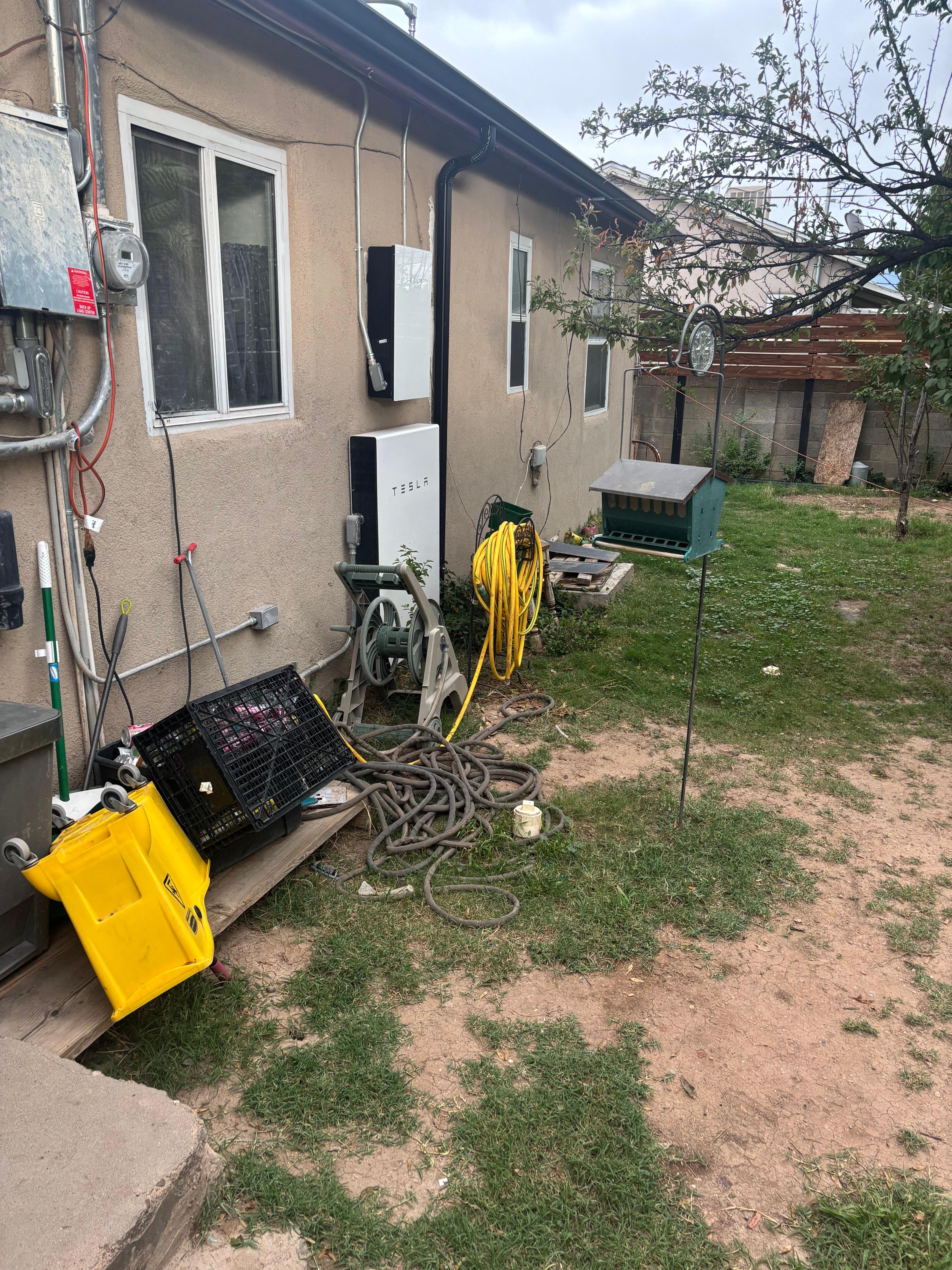 Water from rain makes the back and front yard muddy as there is very little ground covering. 