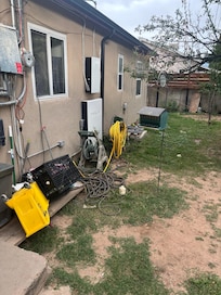 Water from rain makes the back and front yard muddy as there is very little ground covering.