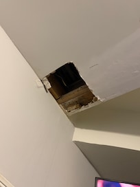 Hole in ceiling in living room