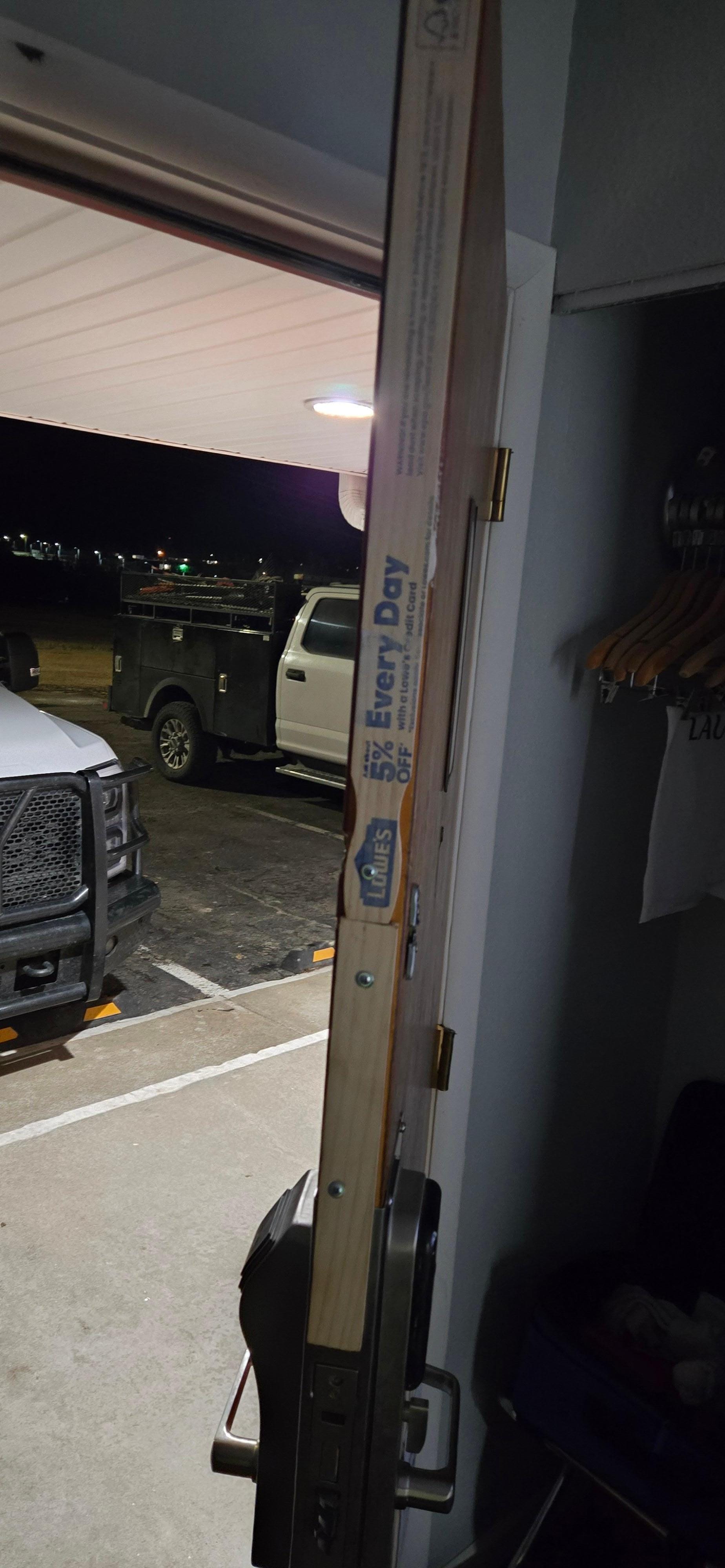 Paint sticks screwed to the door 