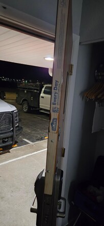 Paint sticks screwed to the door