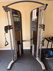 Cable machine in fitness center