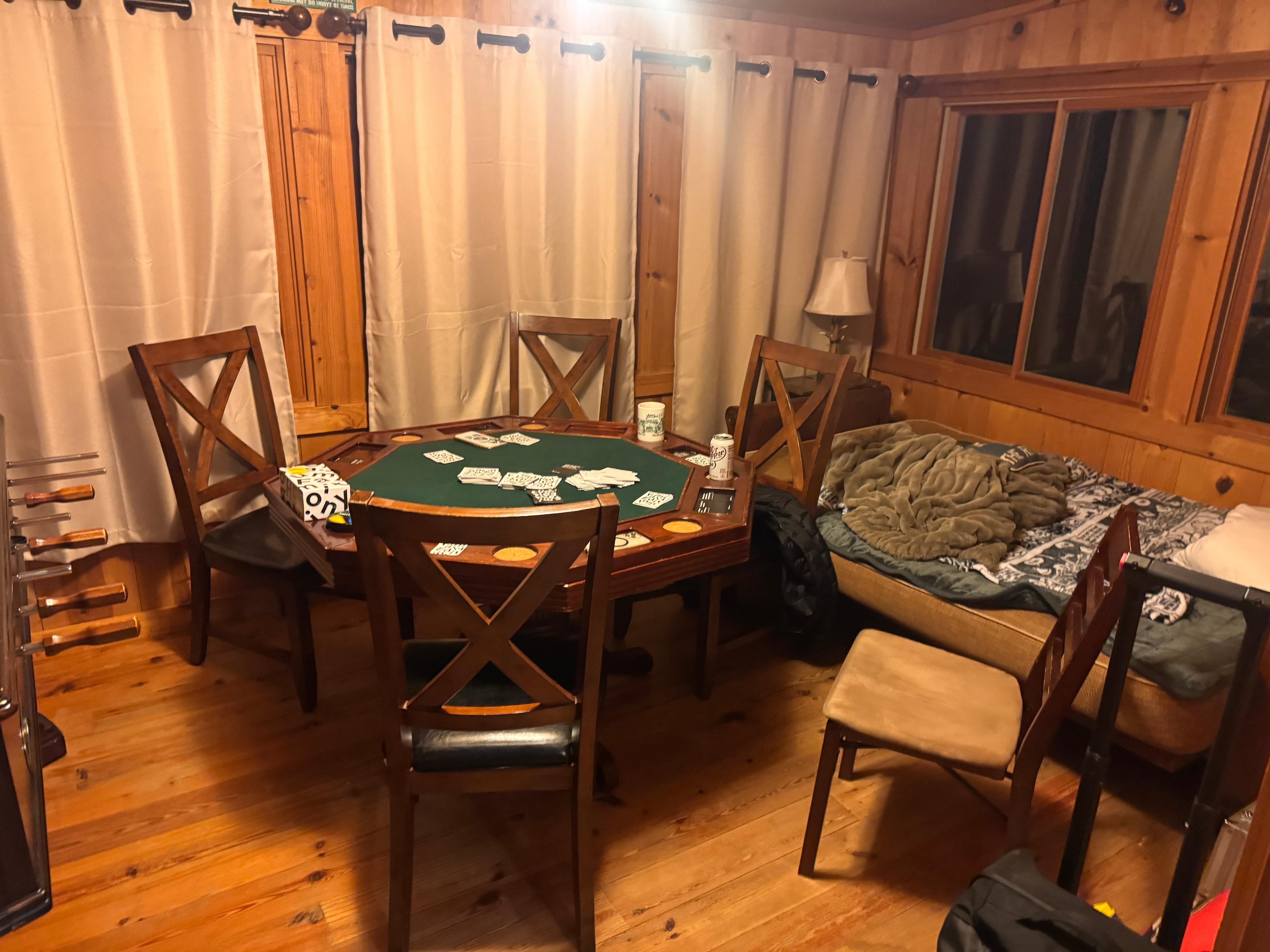 Extra futon bed and gaming table was great for family games overlooking the river. 