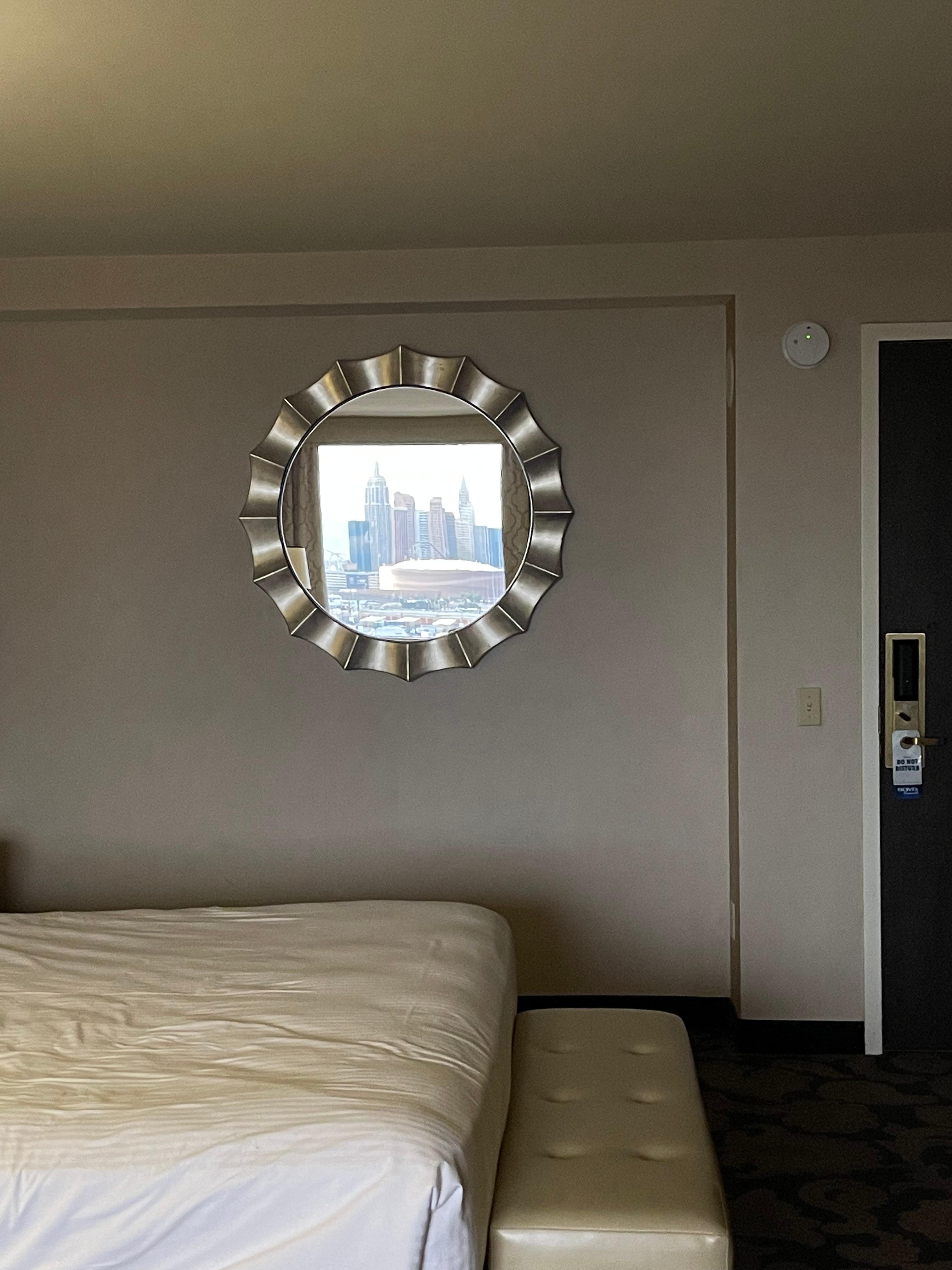 View of part of the room with reflection in mirror