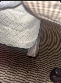 this was the piece of metal on the edge of the bed, that cause a cut in her leg.