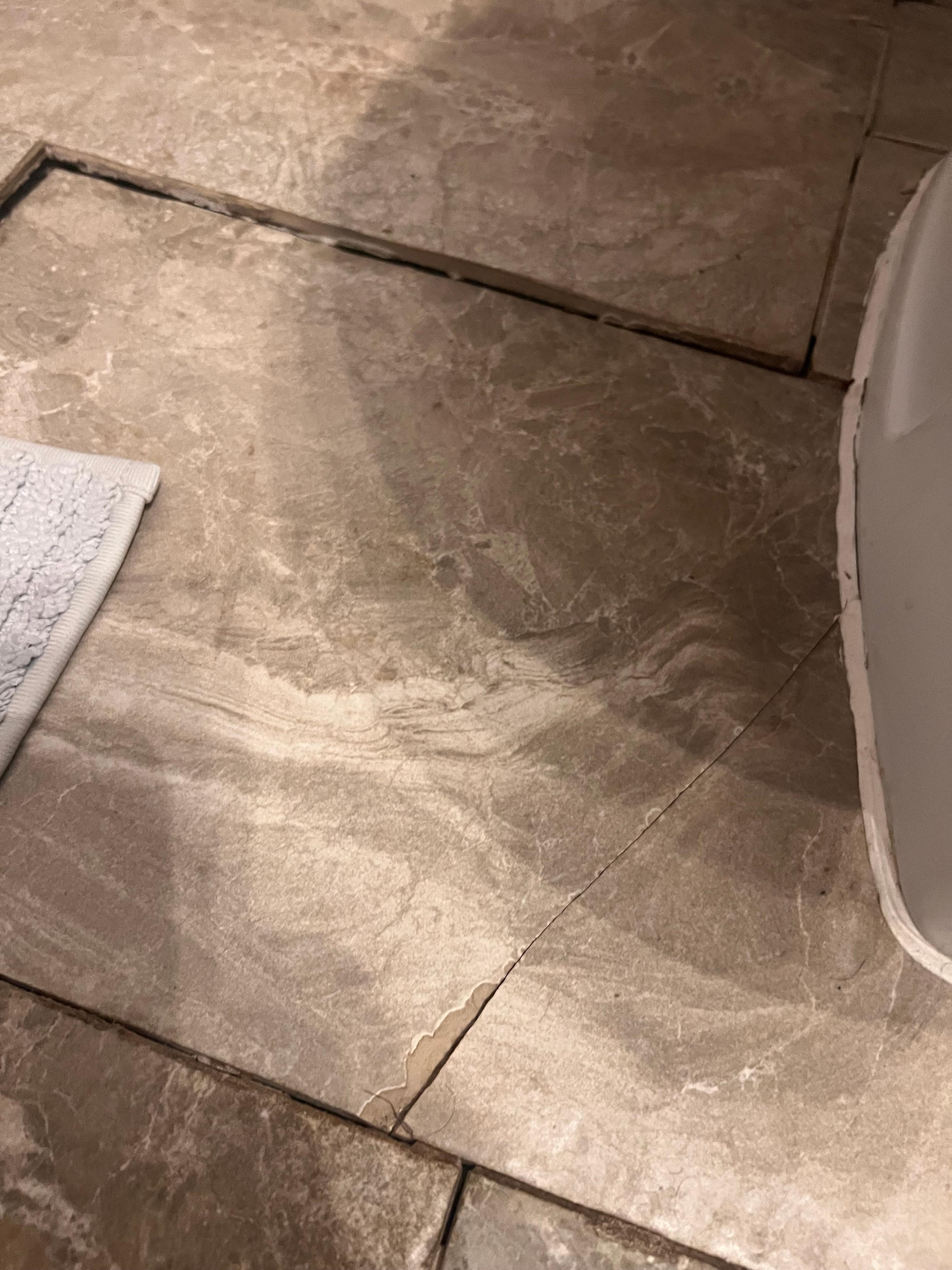 Cracked and sunken tile