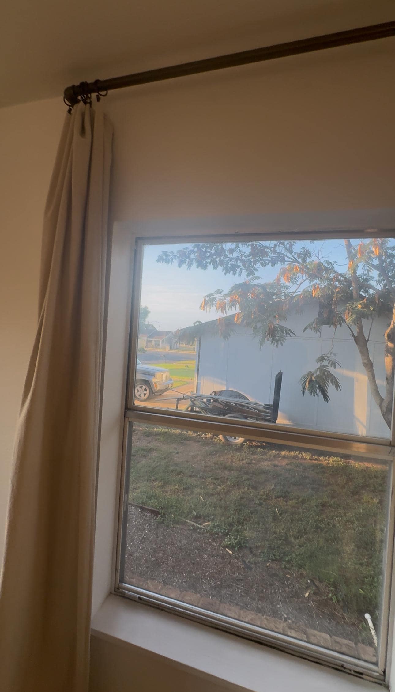 There’s no blinds and no real curtains so you can see the neighbors mess next-door. 