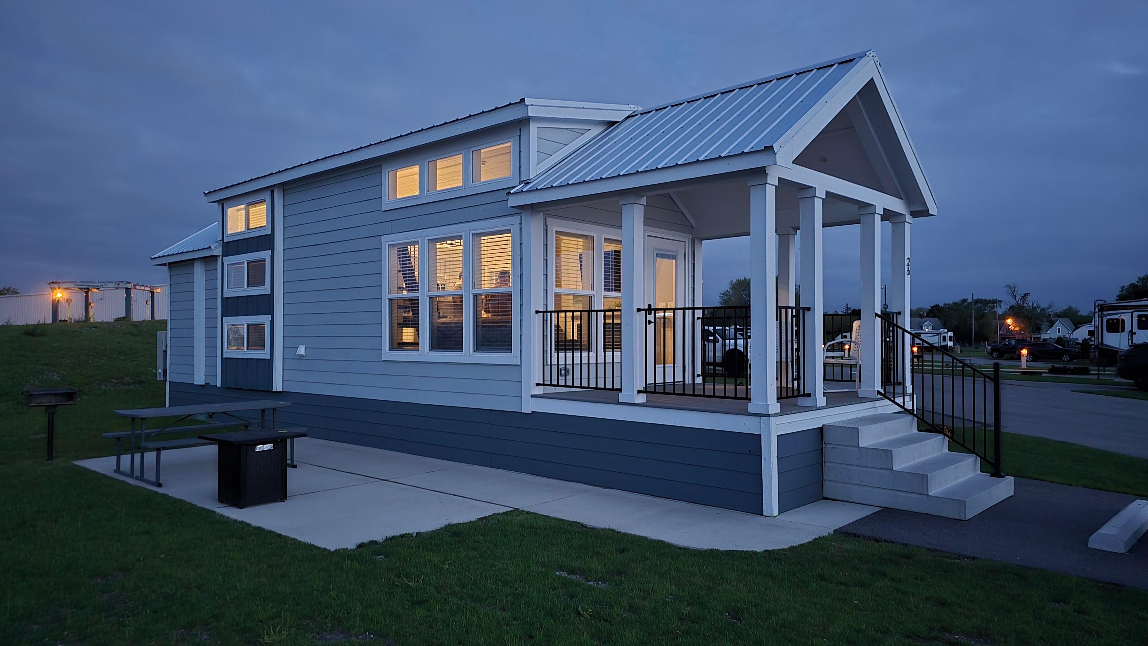 A few of the cottage. The Three stacked windows on the left side provide ventilation for the two bunk beds and the loft.