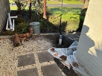 Large hole side of house