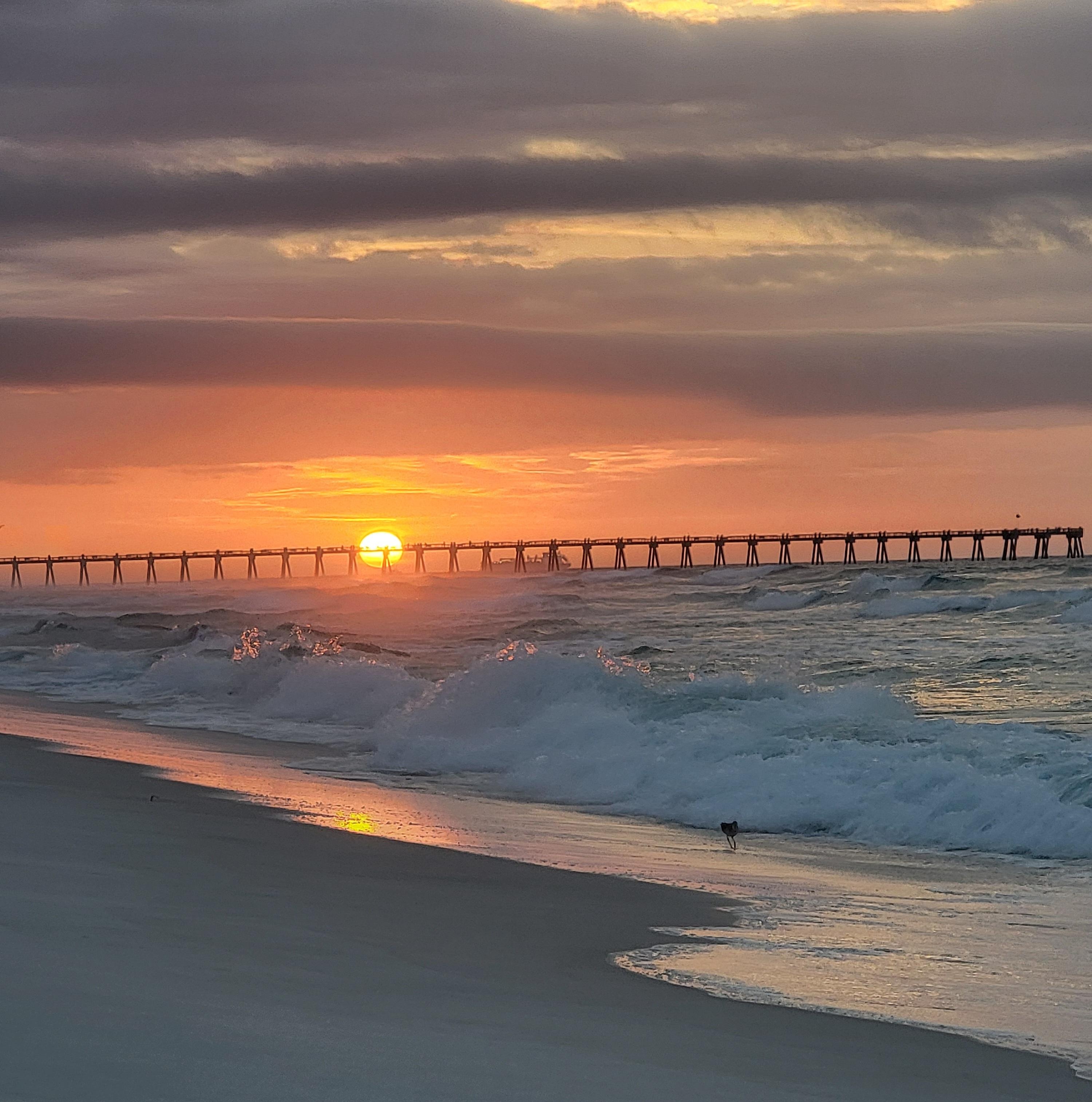 Sunrise across the street on the gulf