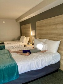 Beautiful standard room first thing my son did was flip on the bed